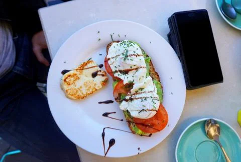 Breakfast - Smashed Avocado and Egg on Toast Stock Photos