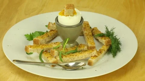 Breakfast with soft-boiled egg and toast Stock Footage 42952635
