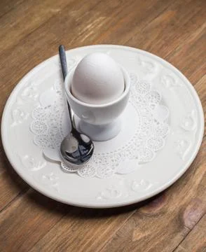 Breakfast with soft-boiled egg, over old wooden table. Stock Photos