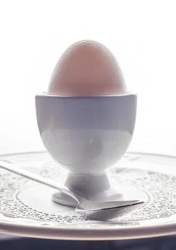 Breakfast with soft-boiled egg, over old wooden table. Stock Photos