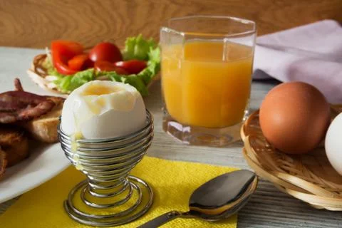 Breakfast with a soft-boiled egg Stock Photos