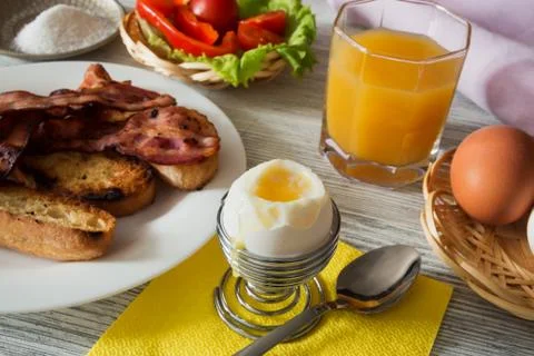 Breakfast with a soft-boiled egg Stock Photos