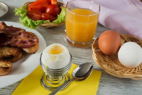 Breakfast with a soft-boiled egg Stock Photos