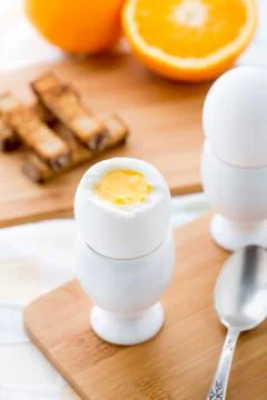 Breakfast with soft boiled eggs and toast soldiers Stock Photos