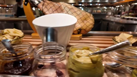 Breakfast Spread Featuring Cold Cuts and Bread Sticks at a Buffet Stock Footage 318926526