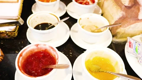 Breakfast Spread with Sauces and Bread Stock Footage 309503548