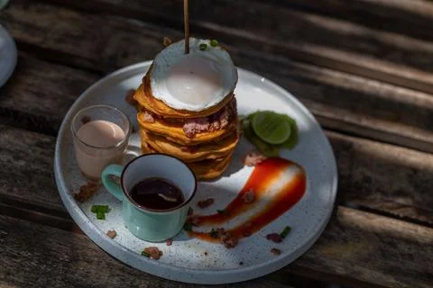 Breakfast a stack of pancakes and eggs 스톡 사진