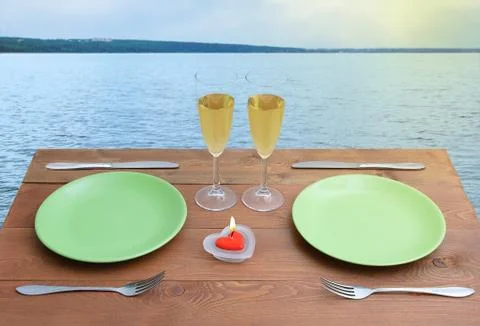 Breakfast table. On the background of the sea. Stock Photos