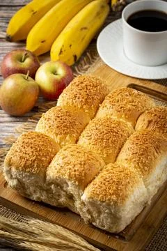 Breakfast table with coconut bread and fruits. Stock Photos