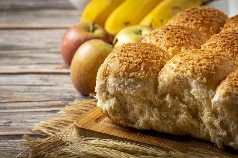 Breakfast table with coconut bread and fruits. Stock Photos
