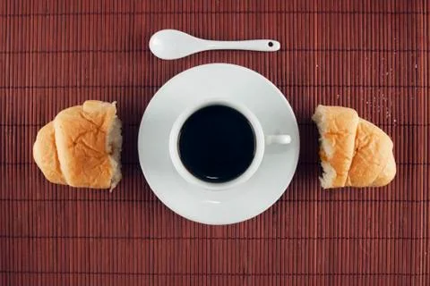 Breakfast table with coffee and jam croissant Stock Photos