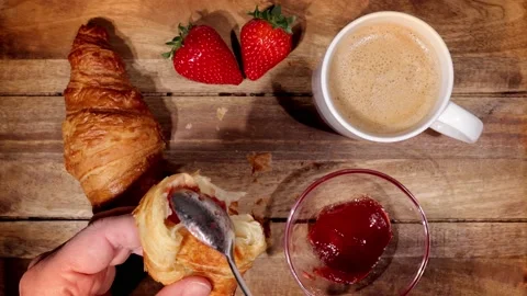 Breakfast table with coffee croissants and jam Stock Footage 151125453