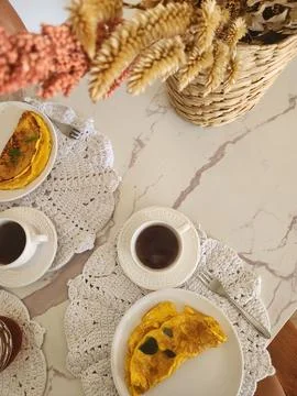 Breakfast table with couscous eggs and cheese Stock Photos