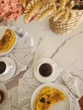 Breakfast table with couscous eggs and cheese Stock Photos