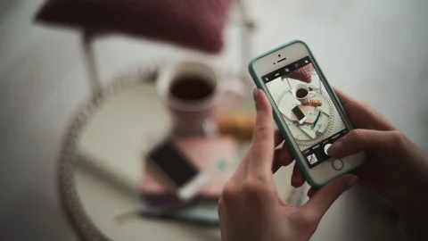 Breakfast on the table croissant shooting on iphone Stock Footage 105483962