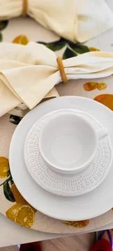 Breakfast table decorated with white cup and napkins Foto stock