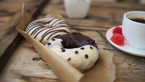 Breakfast table with donuts and coffee Video stock 84766453