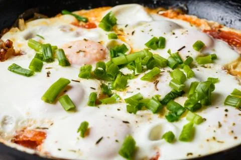 Breakfast on the table: a fried egg in frying pan Stock Photos