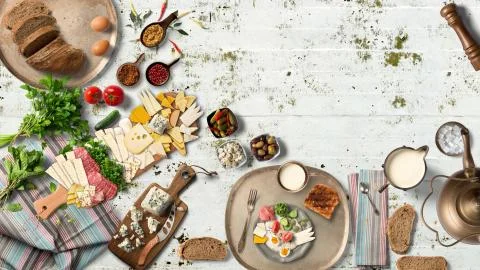 Breakfast table with great vegetable and cheeses from top view Stock Illustration