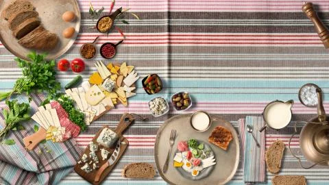 Breakfast table with great vegetable and cheeses from top view Stock Illustration