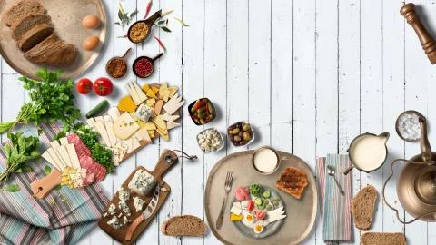 Breakfast table with great vegetable and cheeses from top view Stock Illustration