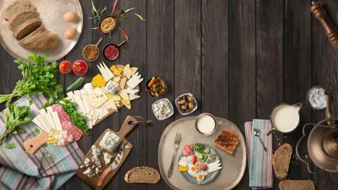 Breakfast table with great vegetable and cheeses from top view Stock Illustration