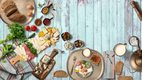 Breakfast table with great vegetable and cheeses from top view Stock Illustration