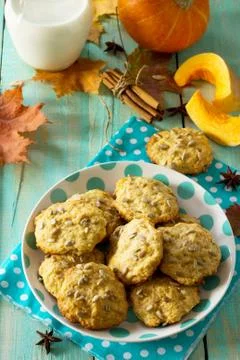 Breakfast table with pumpkin scones and milk on a kitchen wooden table. Foto stock