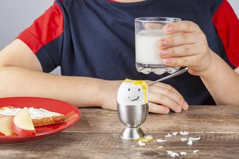 Breakfast table with simple balanced nutritious ingredients. A soft boiled eg Stock Photos