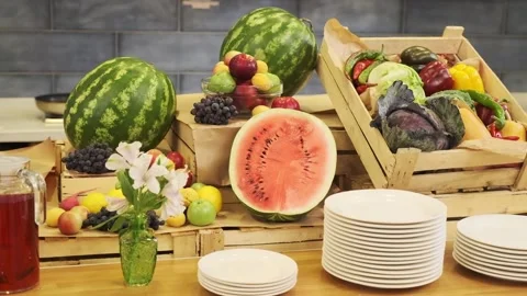 Breakfast table in a small hotel. Fruits, watermelons, bananas. Stock Footage 244993202