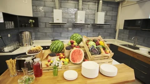 Breakfast table in a small hotel. Fruits, watermelons, bananas. Stock Footage 248746756