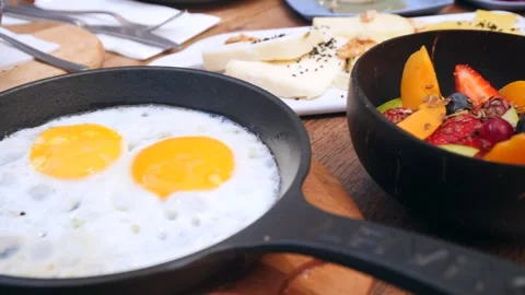 Breakfast table on wooden table Stock Footage 243191345