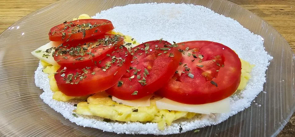 Breakfast with tapioca stuffed with eggs. Stock Photos