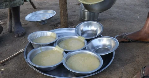 Breakfast Time in a Refugee Settlement Stock Footage 93915417