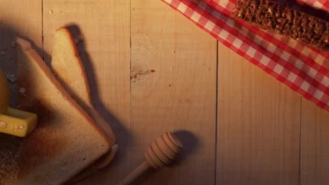 Breakfast of toast on wooden table Stock Footage 164401088