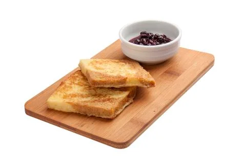 Breakfast. Toasts with jam. On a white background Stock Photos