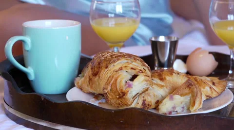 Breakfast tray in bed Stock Footage 32163812