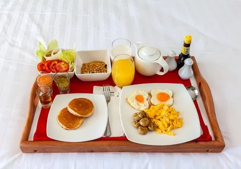 Breakfast in tray on bed Foto stock