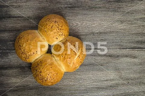 Breakfast turkish bread with sesame picture emerging from the oven Stock Photos