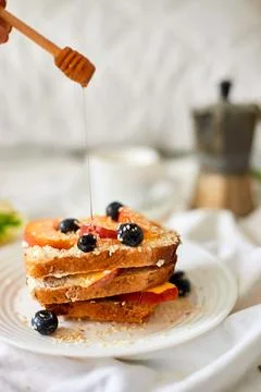 Breakfast on white bed sheets, good morning, summer french toast Stock Photos
