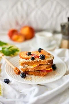 Breakfast on white bed sheets, good morning, summer french toast Stock Photos