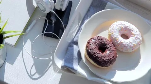 Breakfast on the windowsill: donuts and coffee with marshmallow Stock Footage 68987936