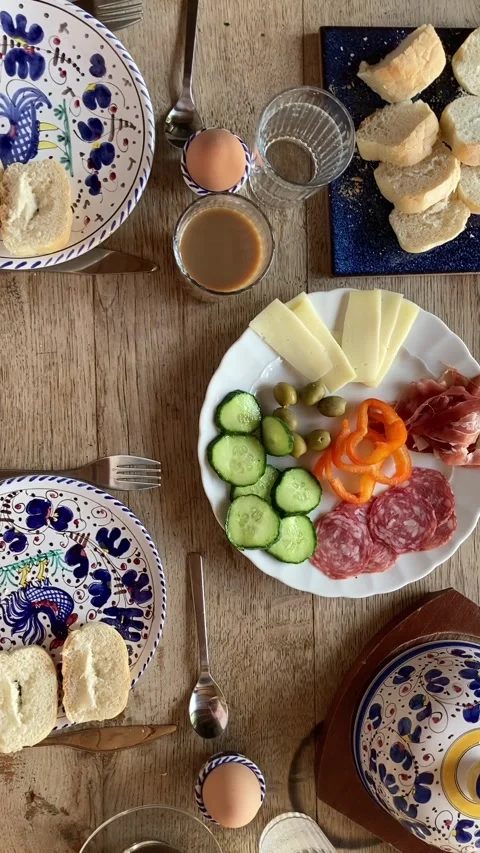 Breakfest table with bread, cheese, olives and coffee Stock Footage 340885226