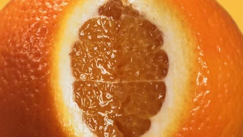 Breaking and open to Half Orange in slow motion. 库存影片 220840927
