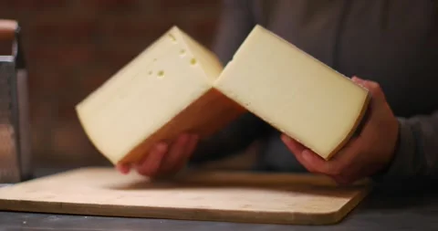 Breaking Apart Cheese Wheel Stock Footage 274774331
