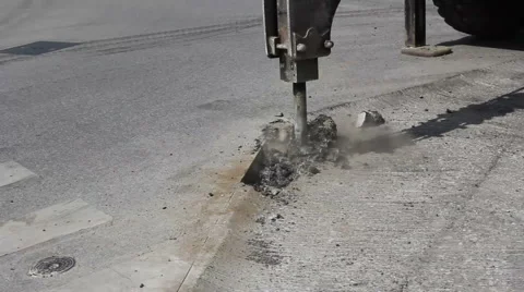 Breaking the asphalt with jack hammer Stock Footage 54120867