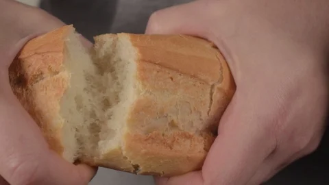 Breaking a baguette, macro Stock Footage 123785121