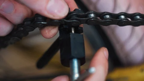Breaking a bike chain Stock Footage 94720281