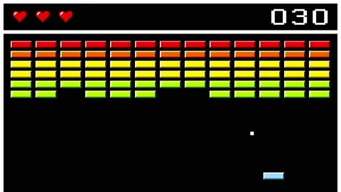 Breaking Blocks WIth Bouncing Ball To Get Score In Classic Retro Video Game Stock Footage 230747999
