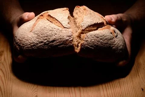 Breaking bread Stock Photos